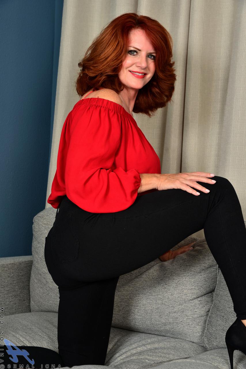 20P Mature ginger Andi James strips and shows her juicy boobs & fuzzy snatch