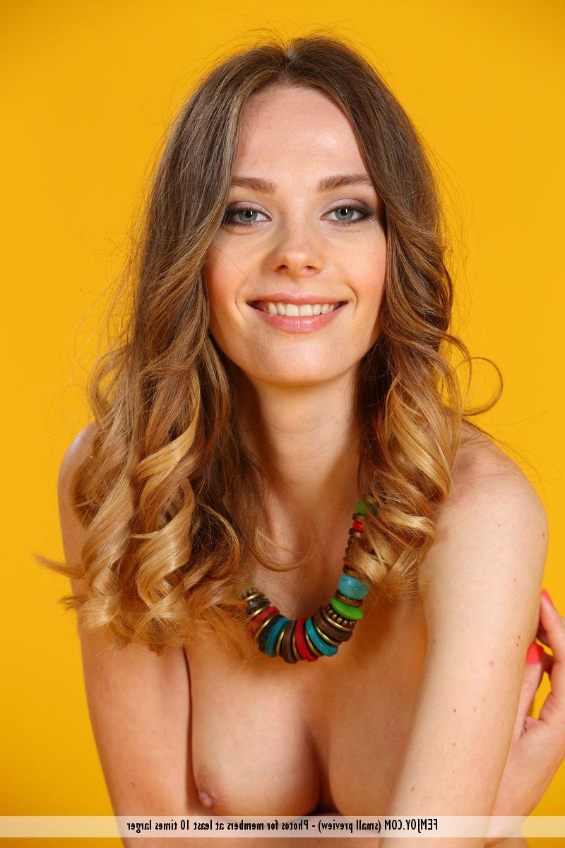 16P Beautiful girl Lena A models in the nude during a solo affair