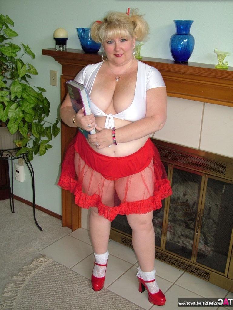 16P Thick blonde Taffy Spanx slides a red thong aside to masturbate with a sex toy