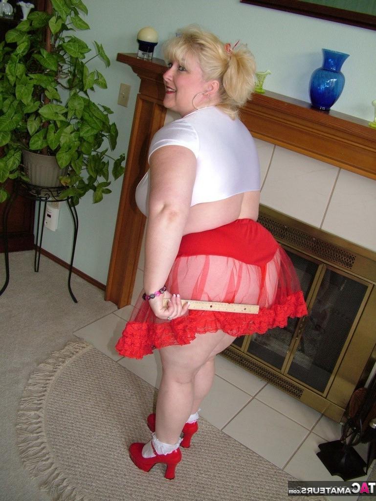 16P Thick blonde Taffy Spanx slides a red thong aside to masturbate with a sex toy