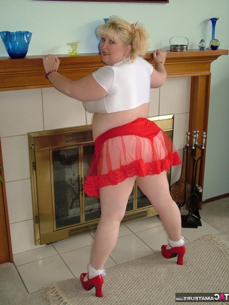 16P Thick blonde Taffy Spanx slides a red thong aside to masturbate with a sex toy