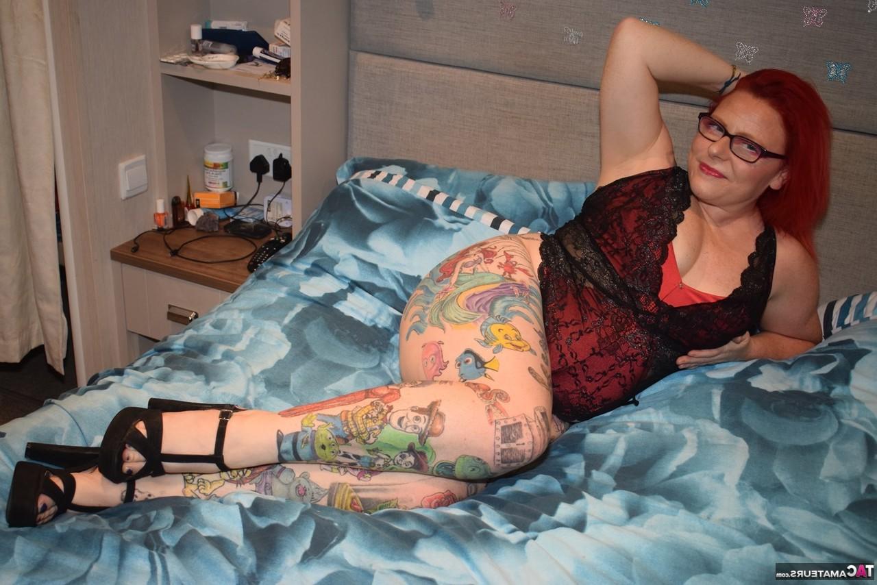 16P Overweight tattooed redhead Mollie Foxxx models lingerie in her bedroom