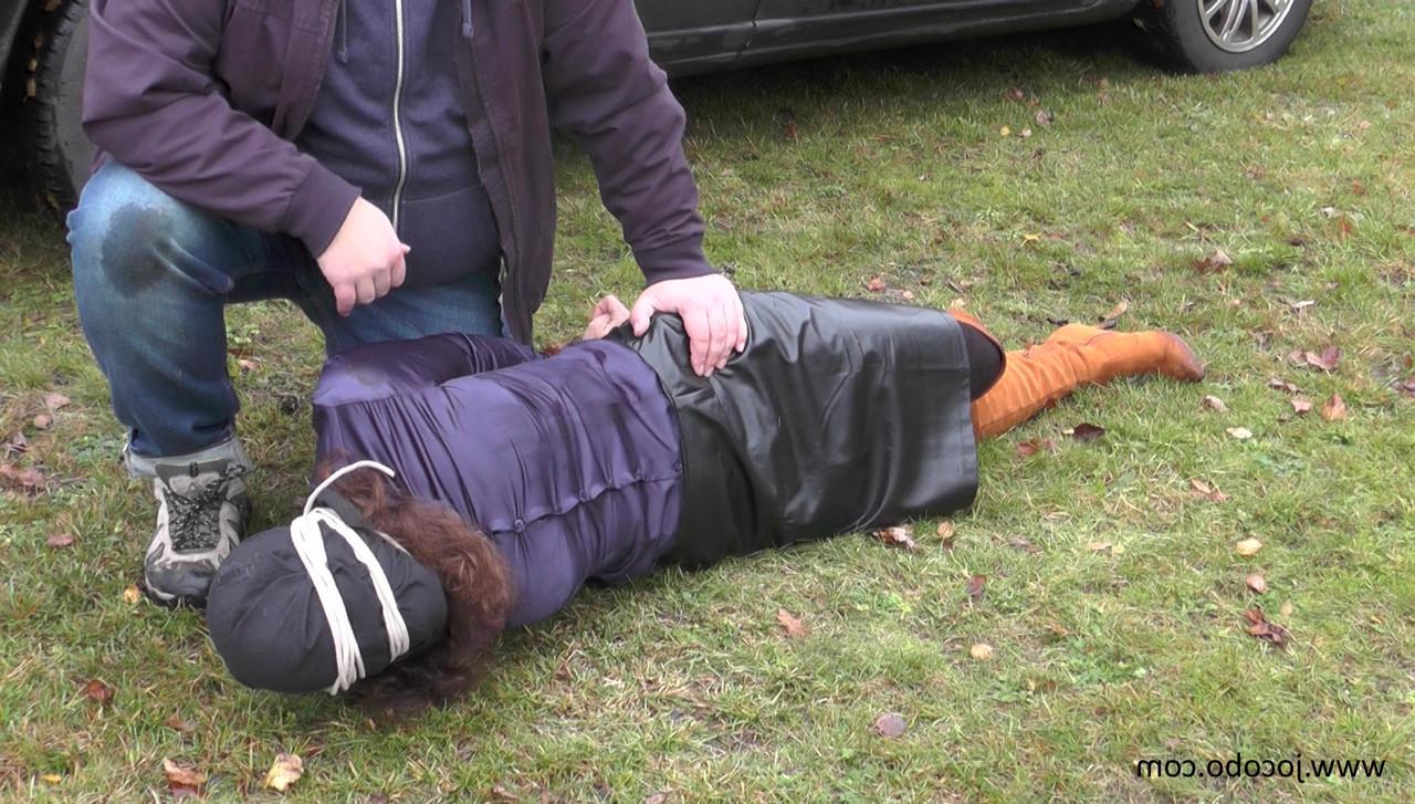 16P Brunette female is rendered unconscious before being loaded into a minivan