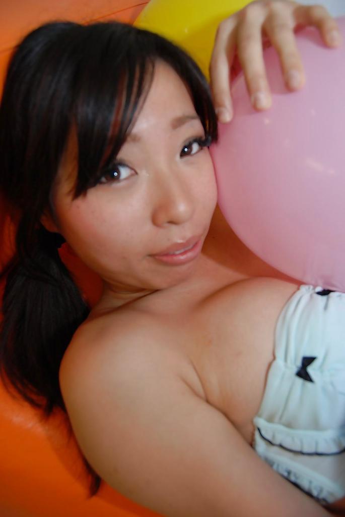 16P Brunette Asian Rika Hirashita is demonstrating her sexy underwear