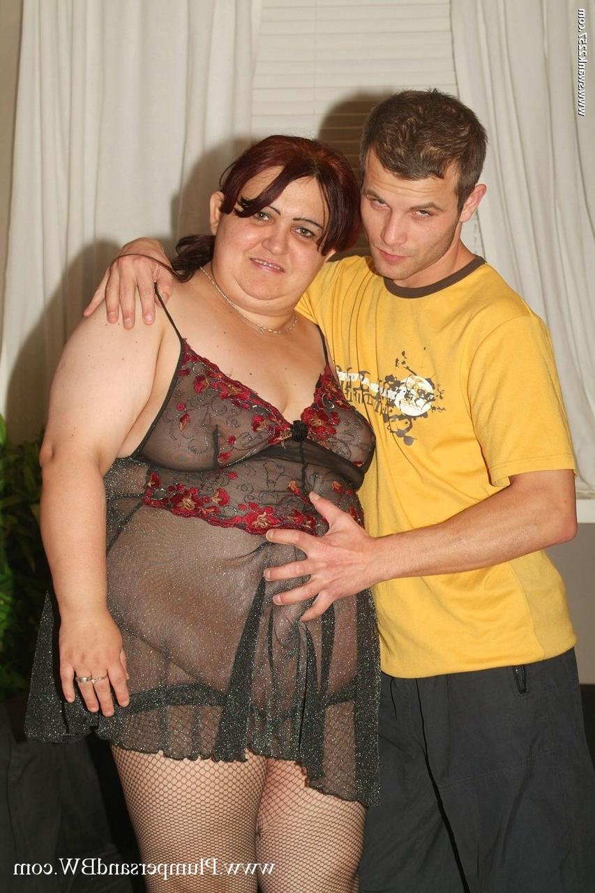 15P Fat redhead Timy Cat gets banged on a couch in ripped mesh stockings