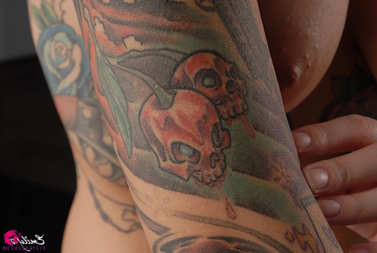 15P Solo model Emily Parker shows off her heavily tattooed body during closeups