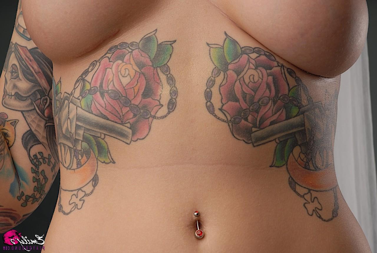 15P Solo model Emily Parker shows off her heavily tattooed body during closeups