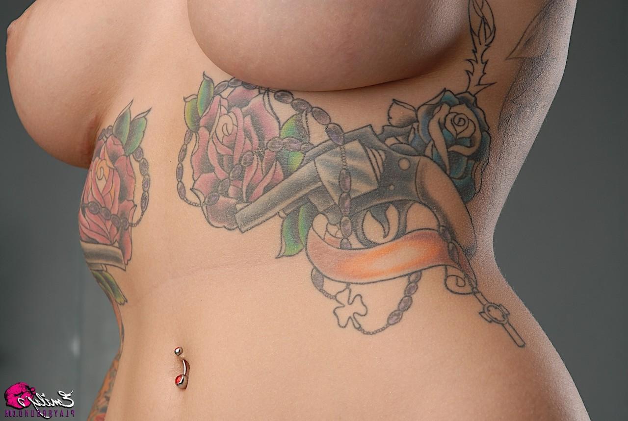 15P Solo model Emily Parker shows off her heavily tattooed body during closeups