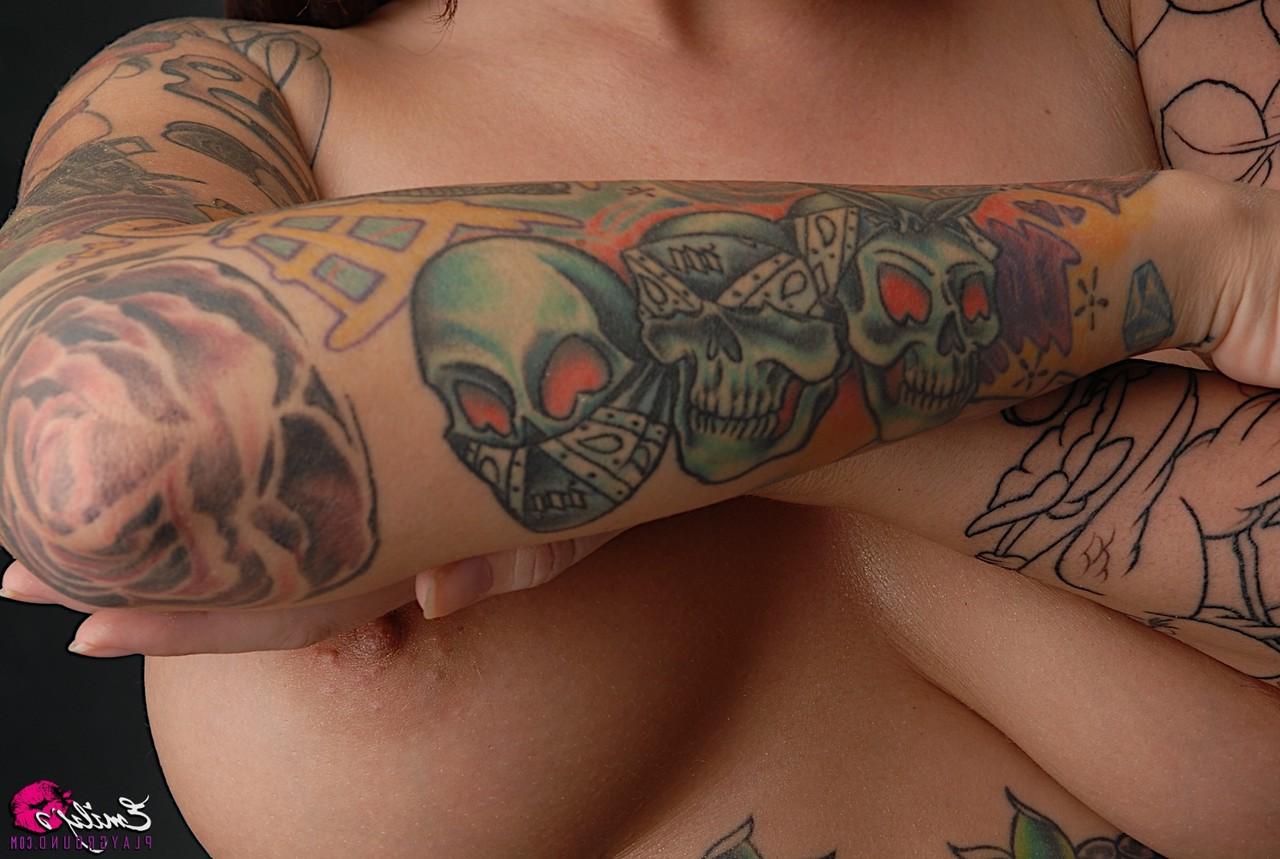 15P Solo model Emily Parker shows off her heavily tattooed body during closeups