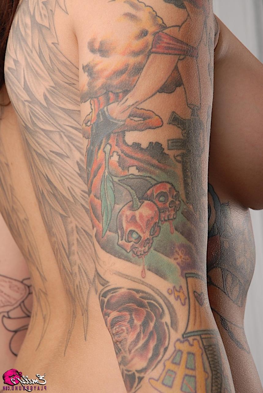 15P Solo model Emily Parker shows off her heavily tattooed body during closeups