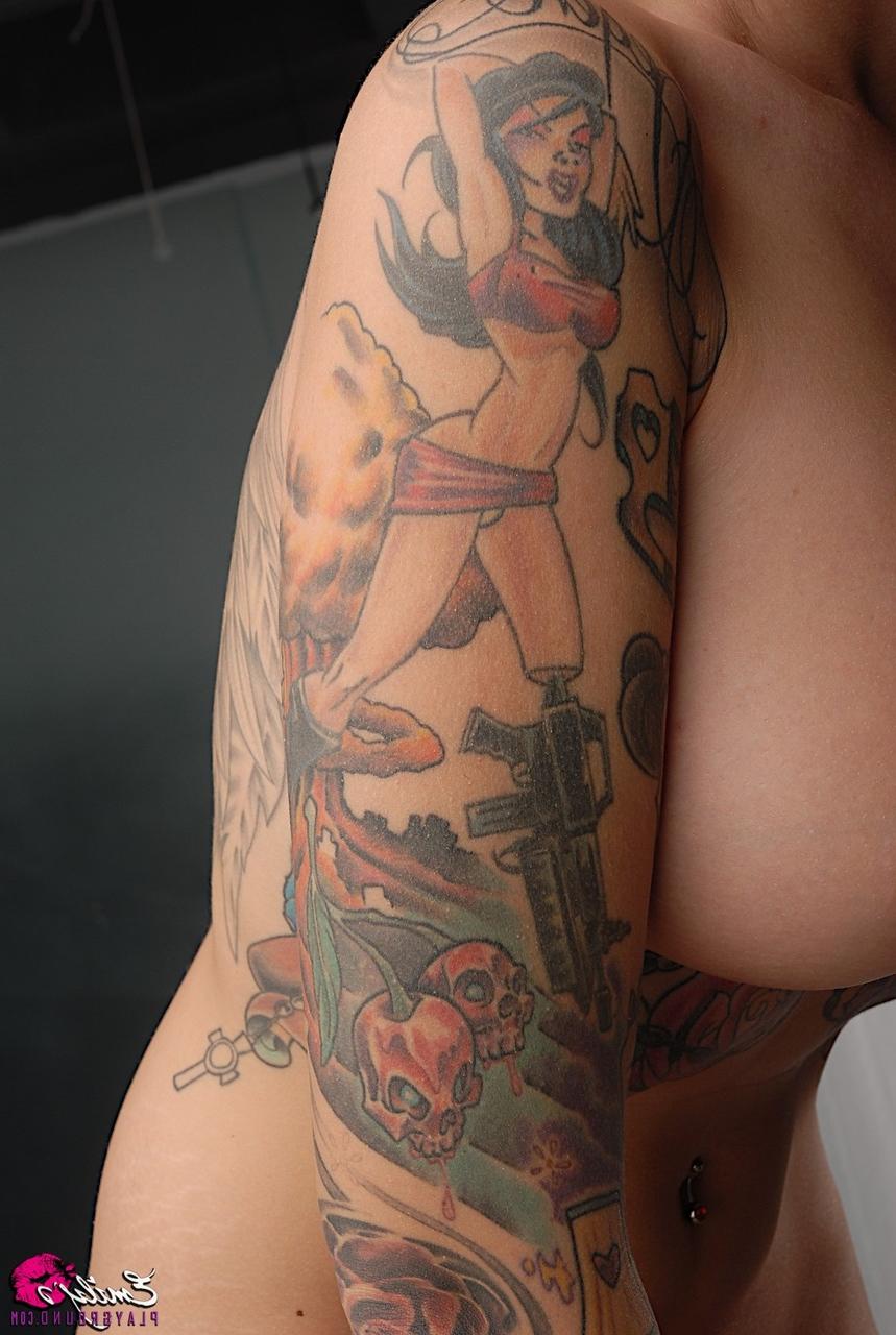 15P Solo model Emily Parker shows off her heavily tattooed body during closeups