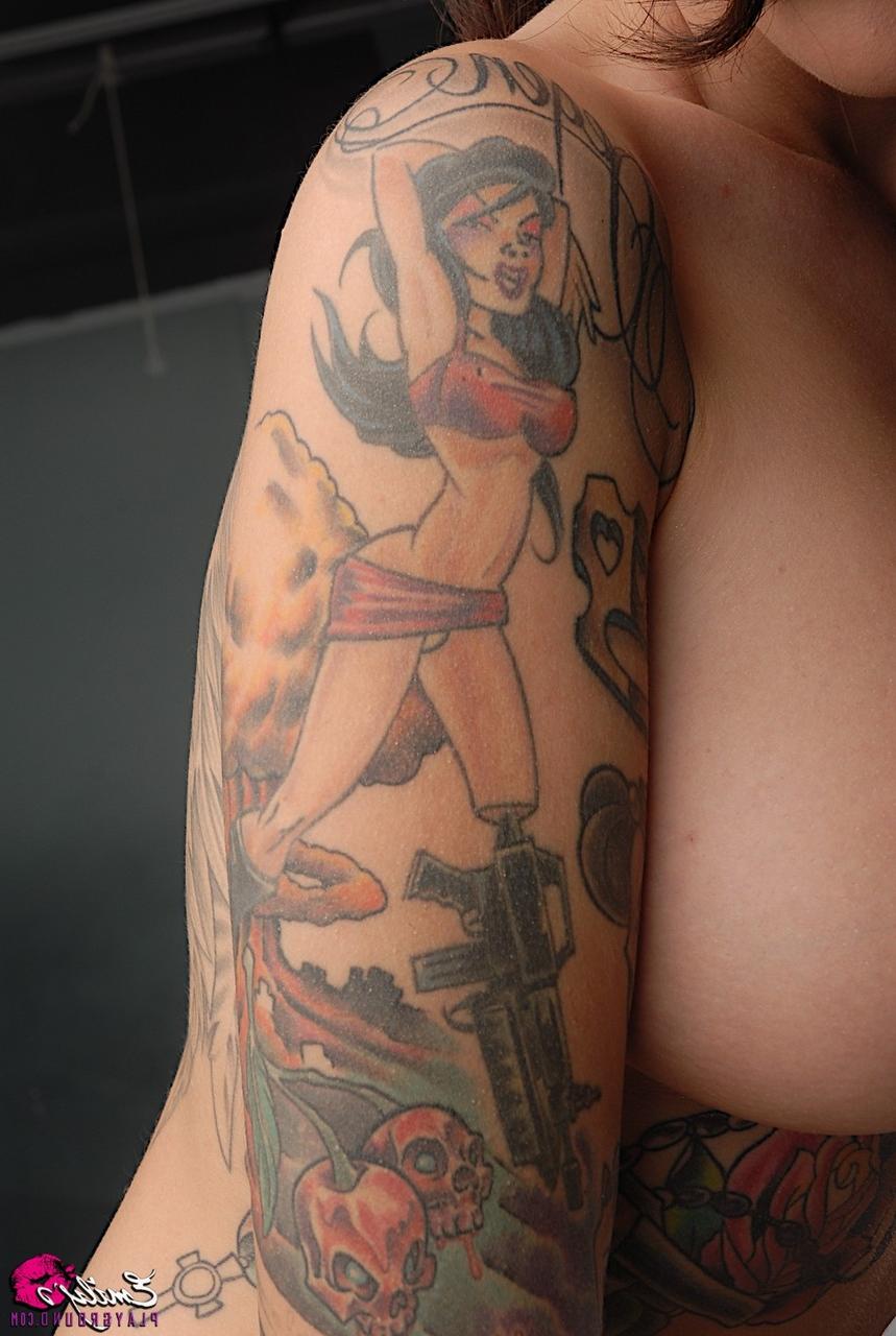 15P Solo model Emily Parker shows off her heavily tattooed body during closeups