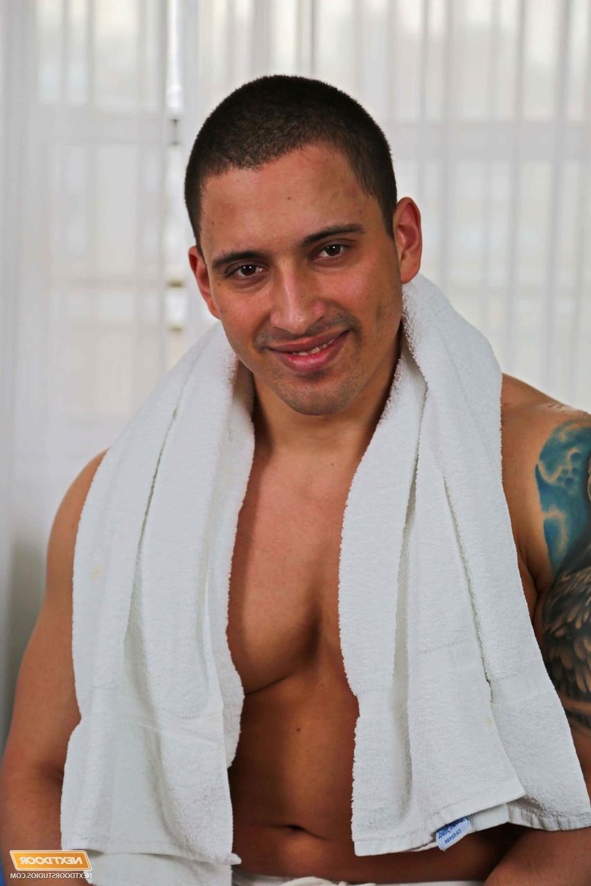 20P Black hunk JP Richards gets down on his knees and blows Latino Carlos B's cock