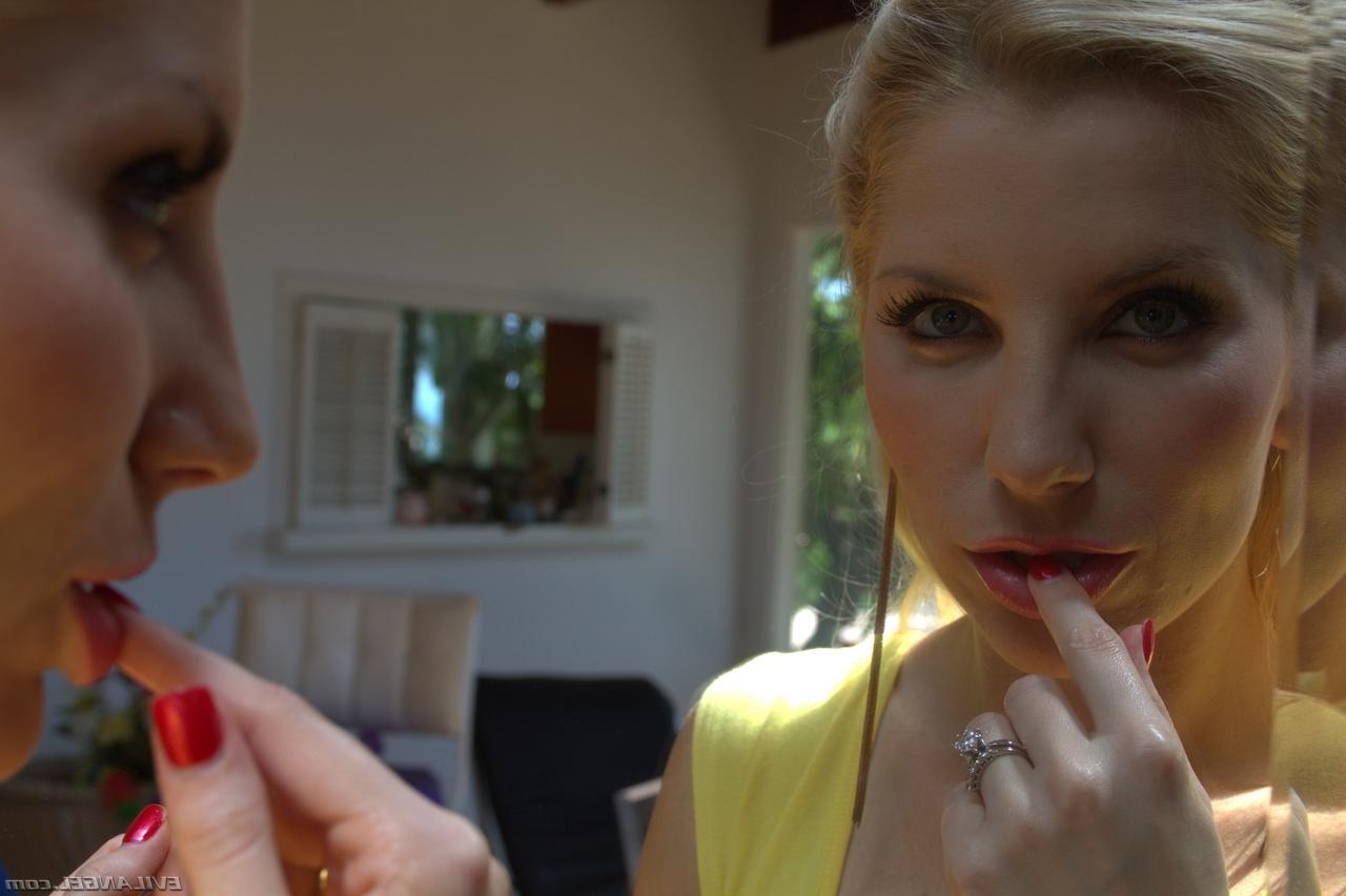 16P Blonde MILF with natural juggs Ashley Fires bends to show her tight ass