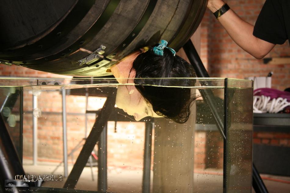 16P Brunette chick is tied up and subjected to water torture by a cruel man