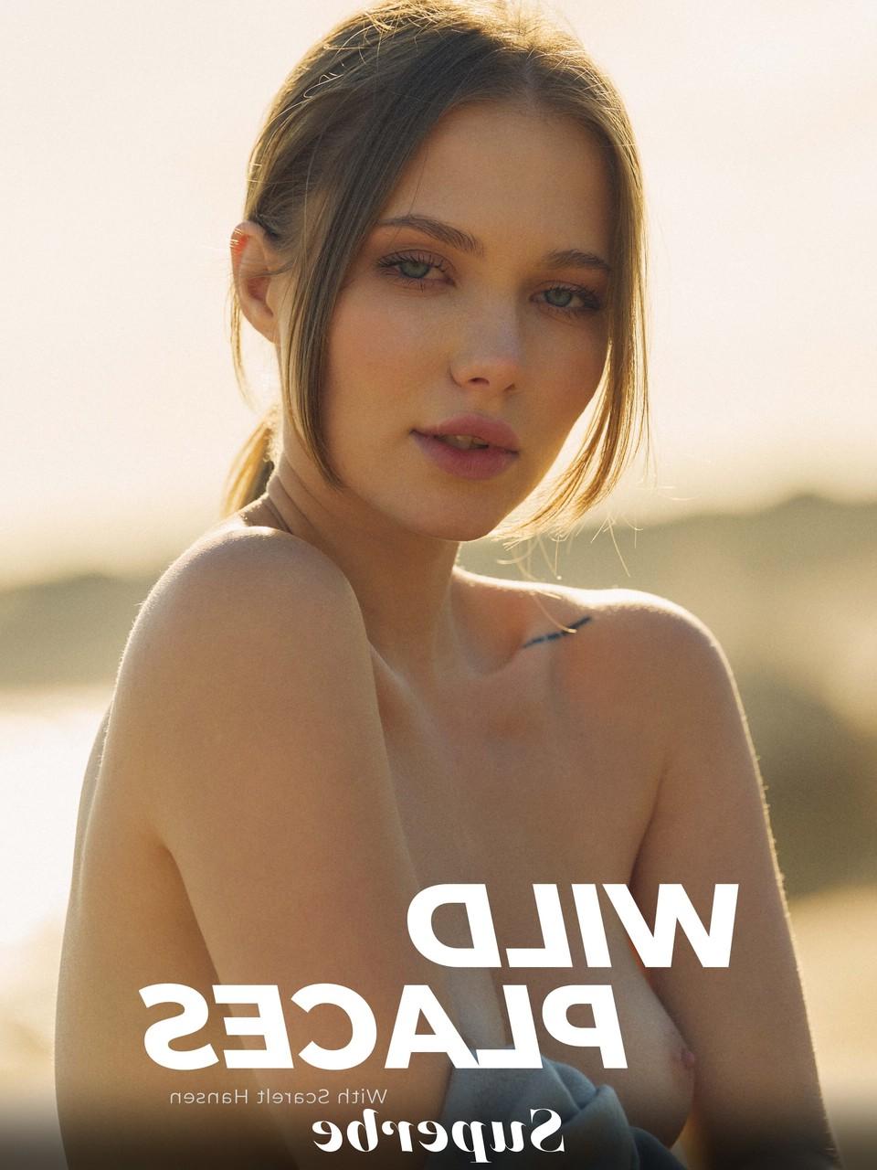 20P Erotic babe Scarlet Hansen strips on the beach & displays her incredible body