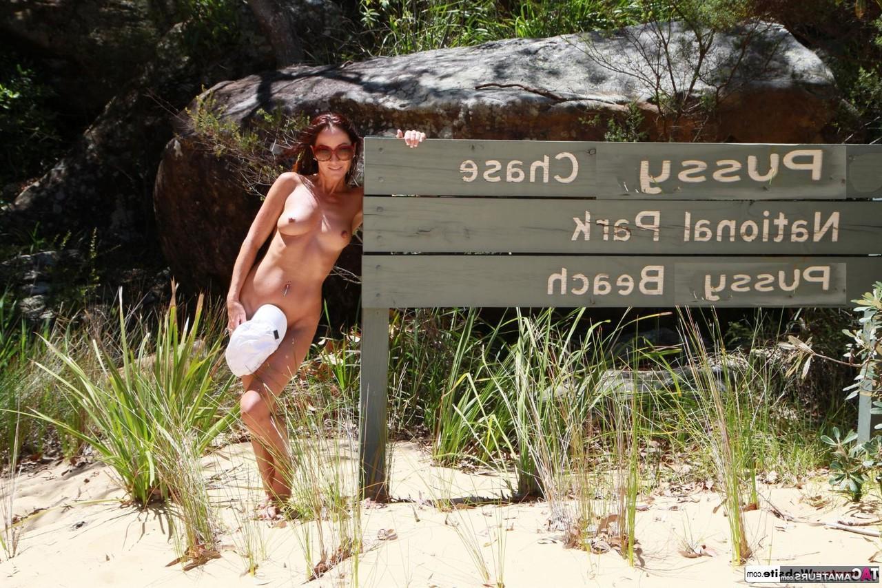 16P Sexy MILF Roxeanne models in the nude at a nudist beach