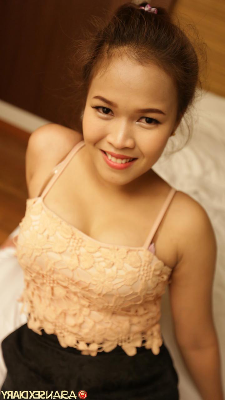 20P Pretty Asian babe Fang ends a sexy striptease with some POV doggystyle sex