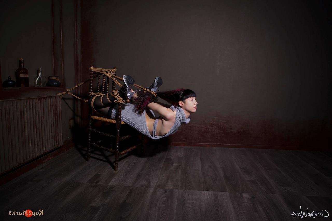 16P Solo girl Carmineworx is tied to a chair in a highly uncomfortable position