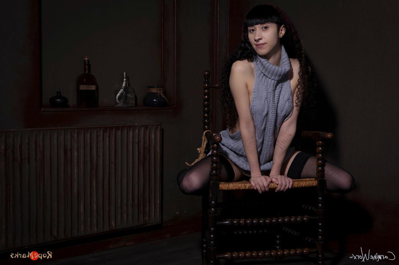 16P Solo girl Carmineworx is tied to a chair in a highly uncomfortable position