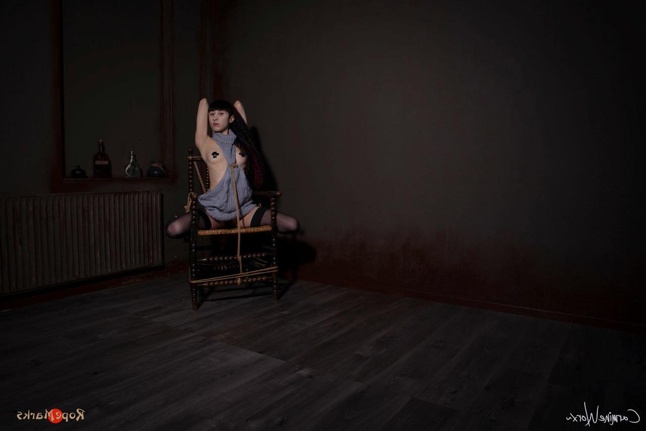 16P Solo girl Carmineworx is tied to a chair in a highly uncomfortable position