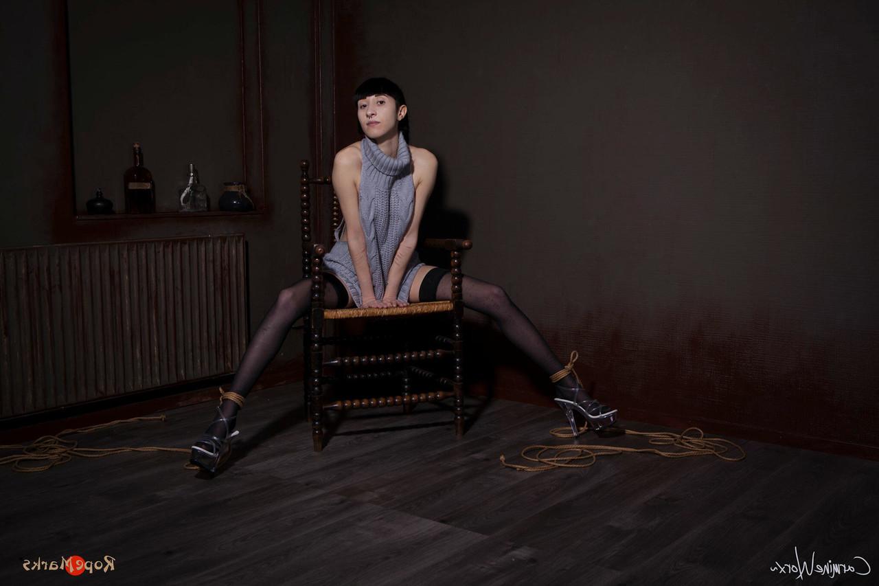 16P Solo girl Carmineworx is tied to a chair in a highly uncomfortable position