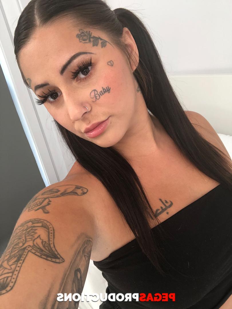 20P Naughty brunette undresses and exposes her chubby tattooed body