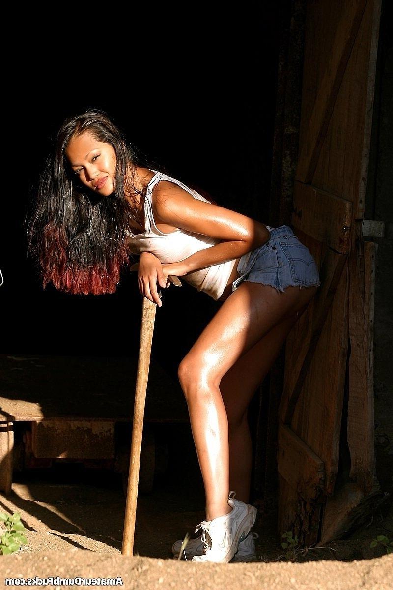 20P Brunette Asian babe Iris Estrada shows off her big tits and oily body outdoors