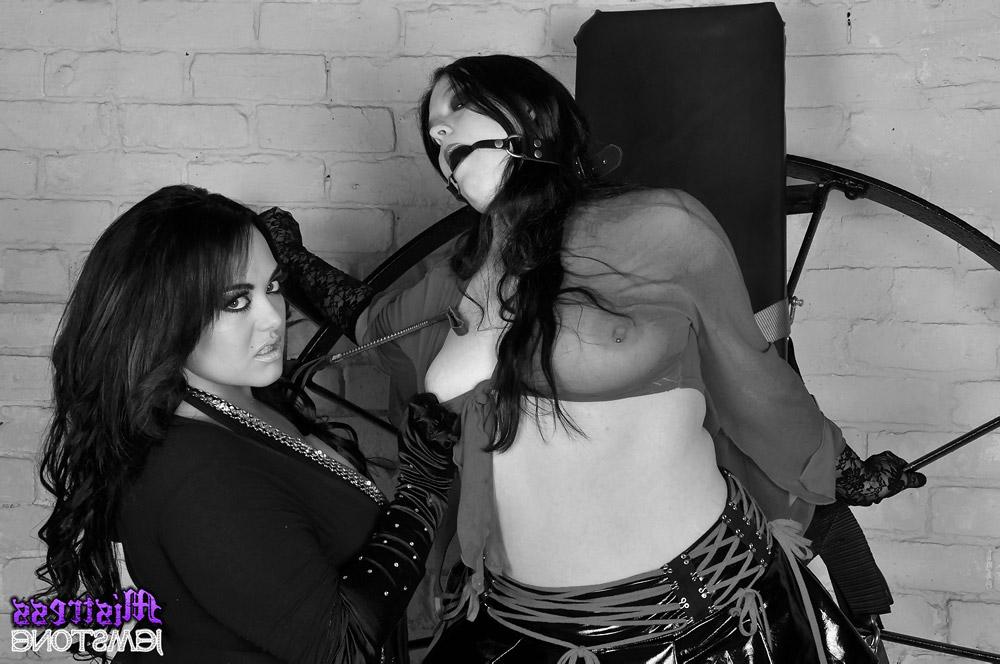 15P Mistress Jemstone has her way with Emma during a round of lezdom play