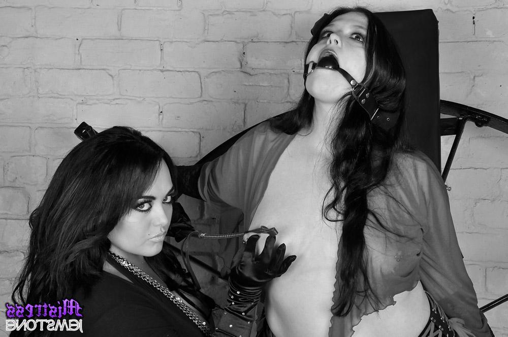 15P Mistress Jemstone has her way with Emma during a round of lezdom play