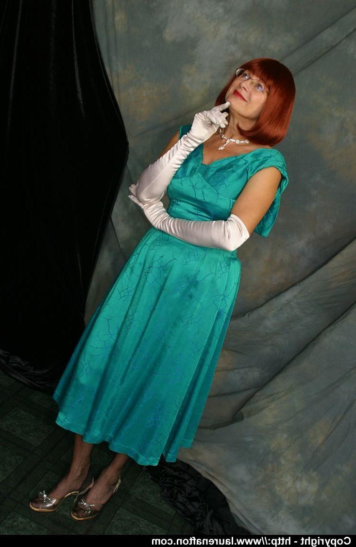 12P Older redhead Abigail Fraser uncovers her natural tits in opera gloves