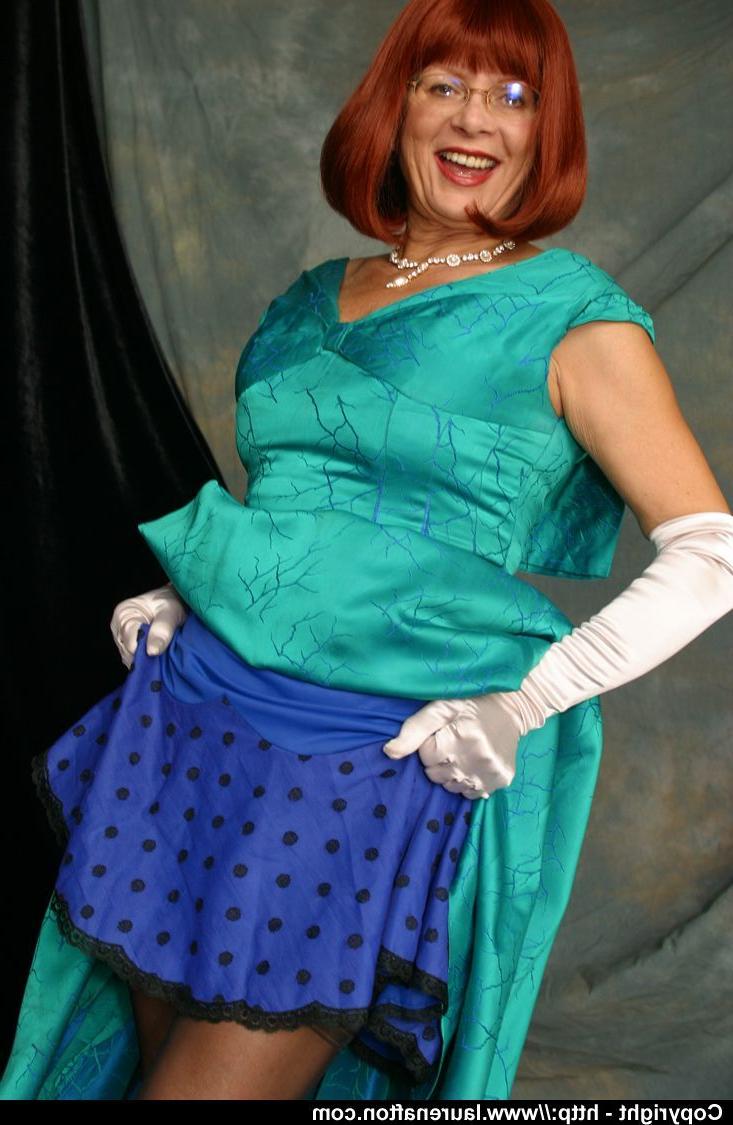 12P Older redhead Abigail Fraser uncovers her natural tits in opera gloves