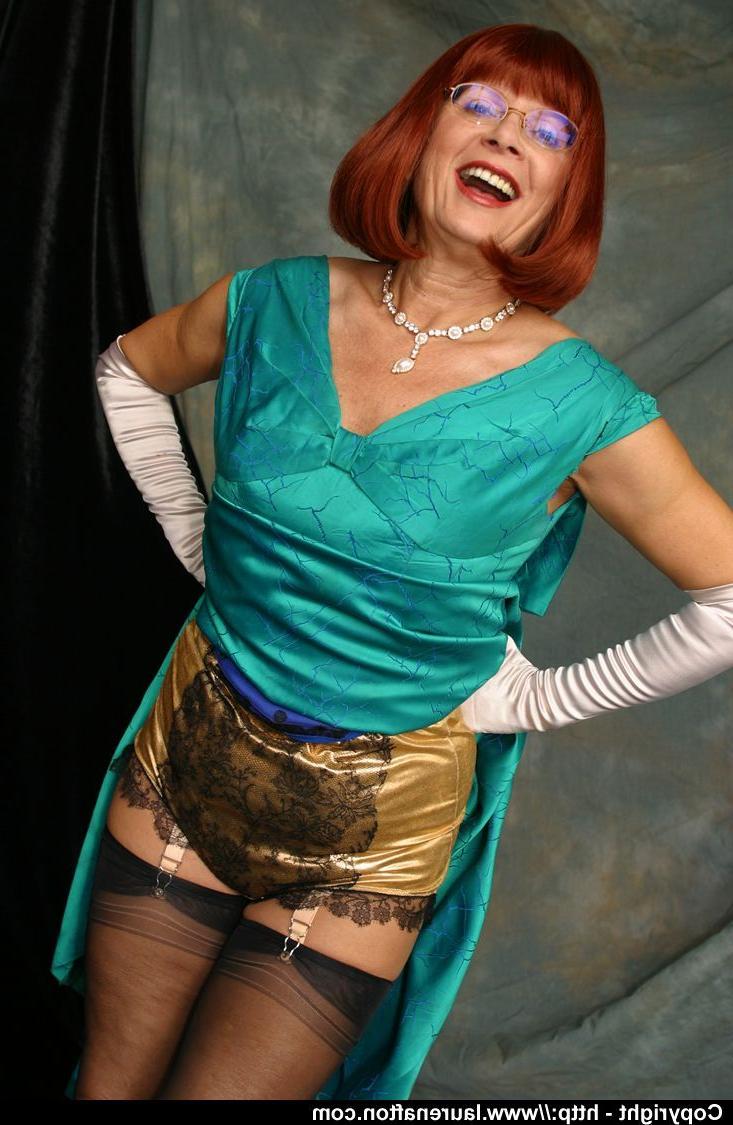 12P Older redhead Abigail Fraser uncovers her natural tits in opera gloves
