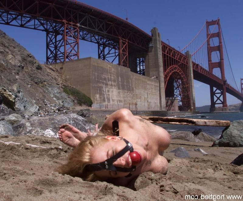 17P Blonde slave Sadie Belle getting bound and ball-gagged on the city beach
