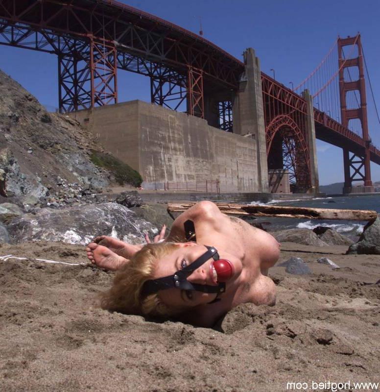 17P Blonde slave Sadie Belle getting bound and ball-gagged on the city beach
