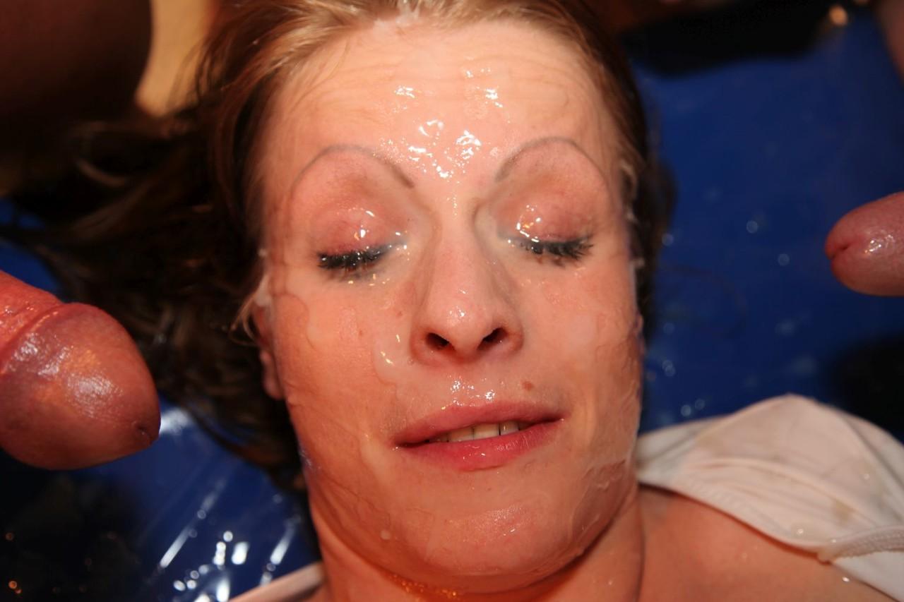 12P Redheaded MILF Kalyee receives facial cumshots during a gangbang