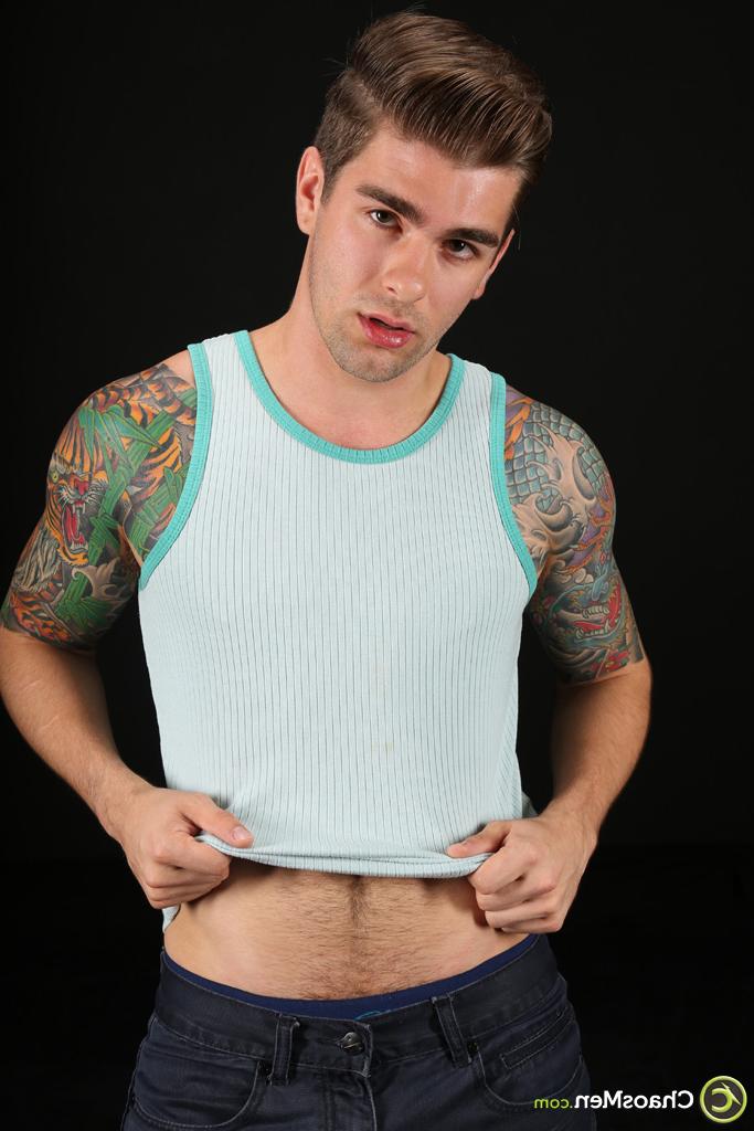 20P Handsome gay model Shiloh strips & exposes his inked body, huge dick & big ass