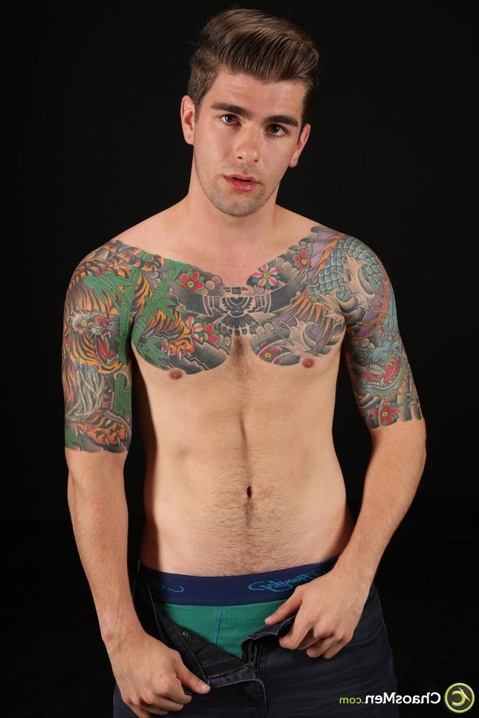 20P Handsome gay model Shiloh strips & exposes his inked body, huge dick & big ass