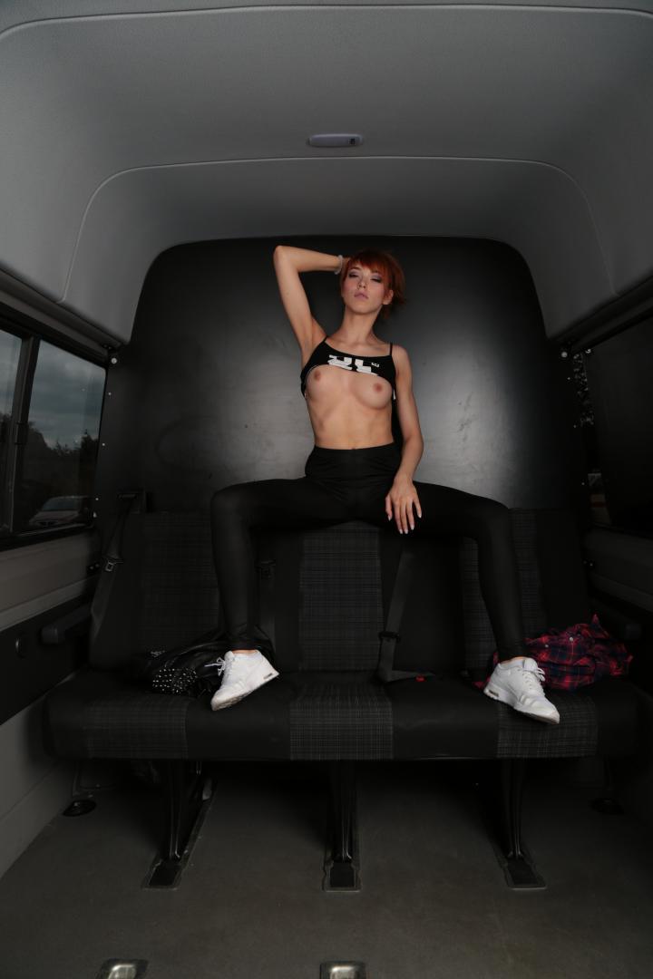 17P Hot German redhead gets naked in a bus and shows off her cute tits and twat