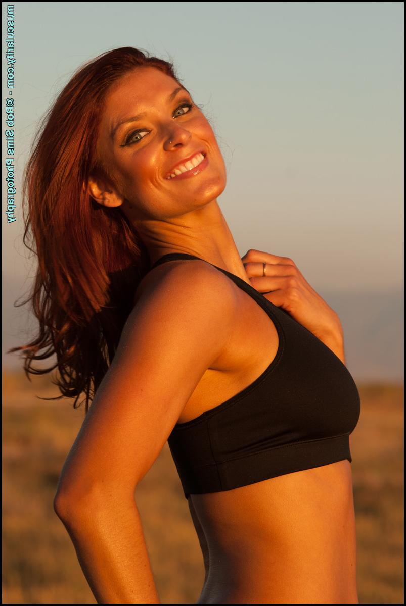 15P Fit redhead Tierney Flickler removes her bikini to model athletic wear