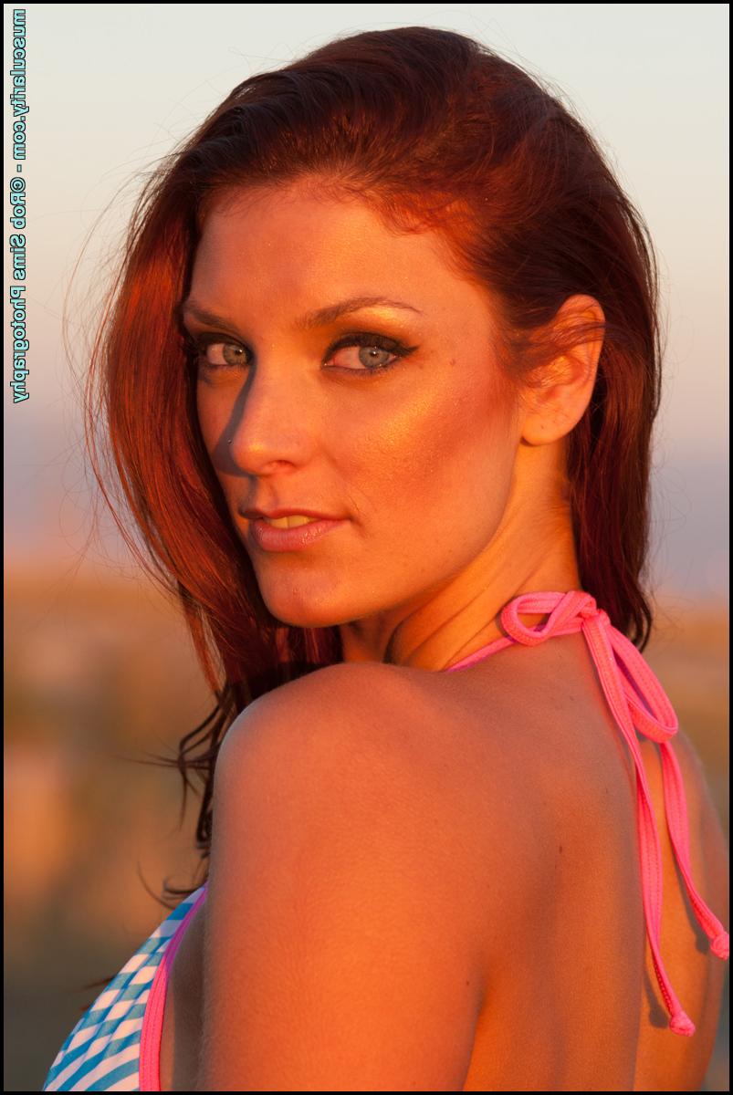 15P Fit redhead Tierney Flickler removes her bikini to model athletic wear