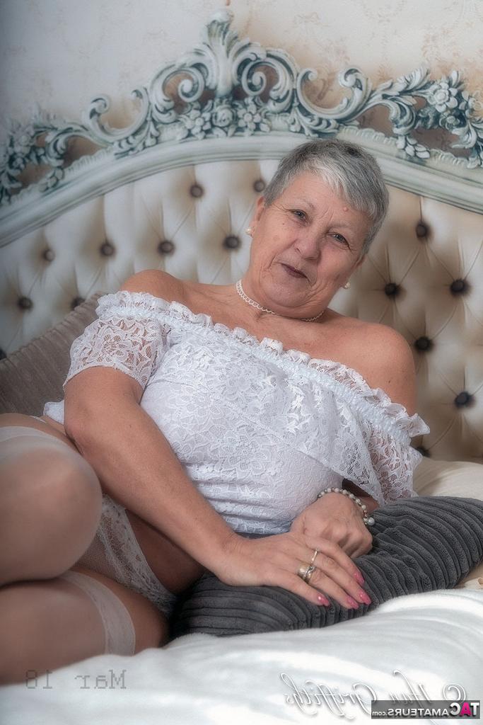 20P Granny first timer Savana hides her naked body after removing lingerie on bed