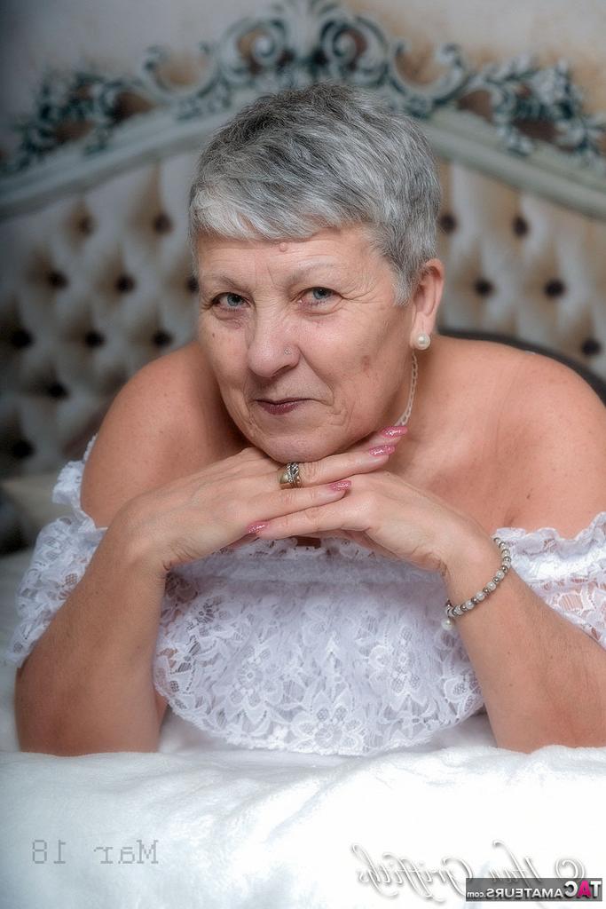 20P Granny first timer Savana hides her naked body after removing lingerie on bed