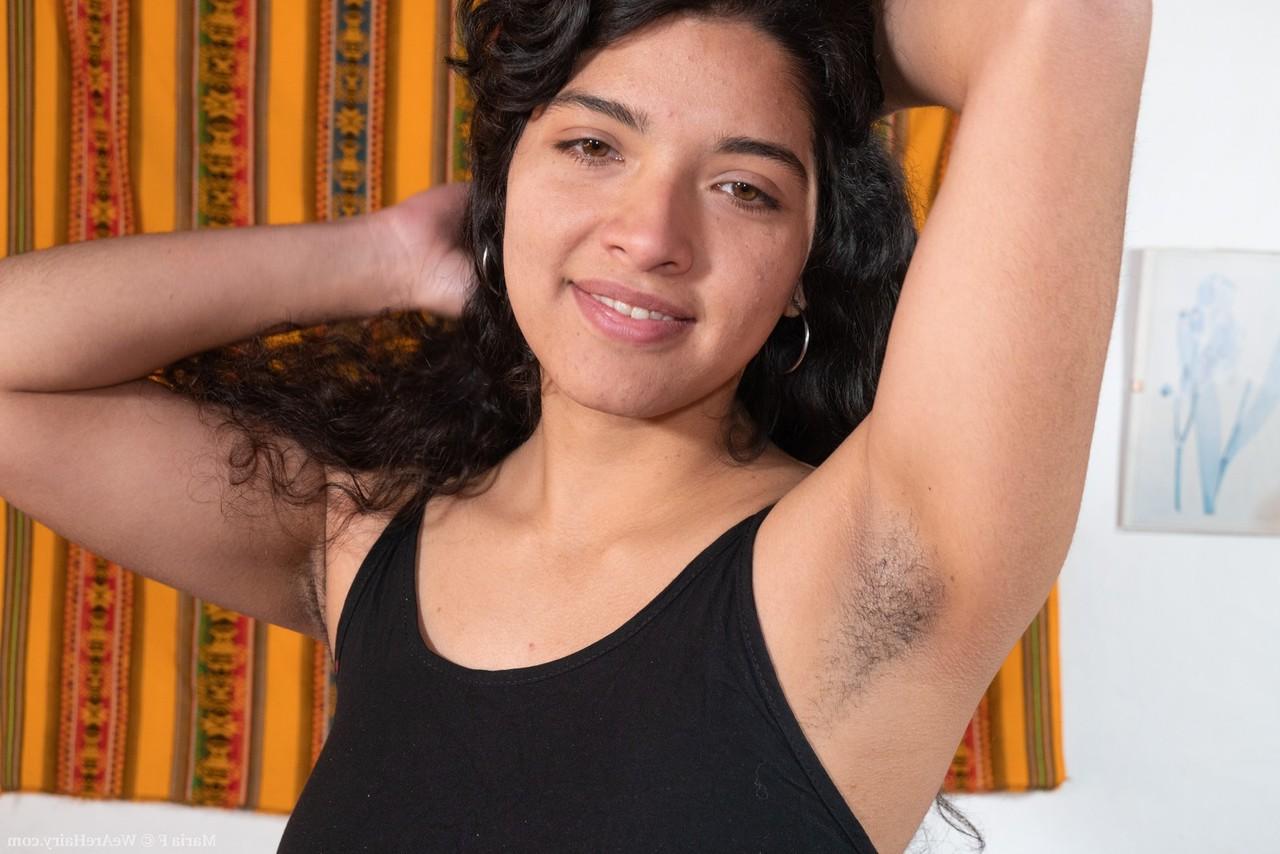 16P Plump amateur Maria F finger spreads her beaver after getting naked on a couch