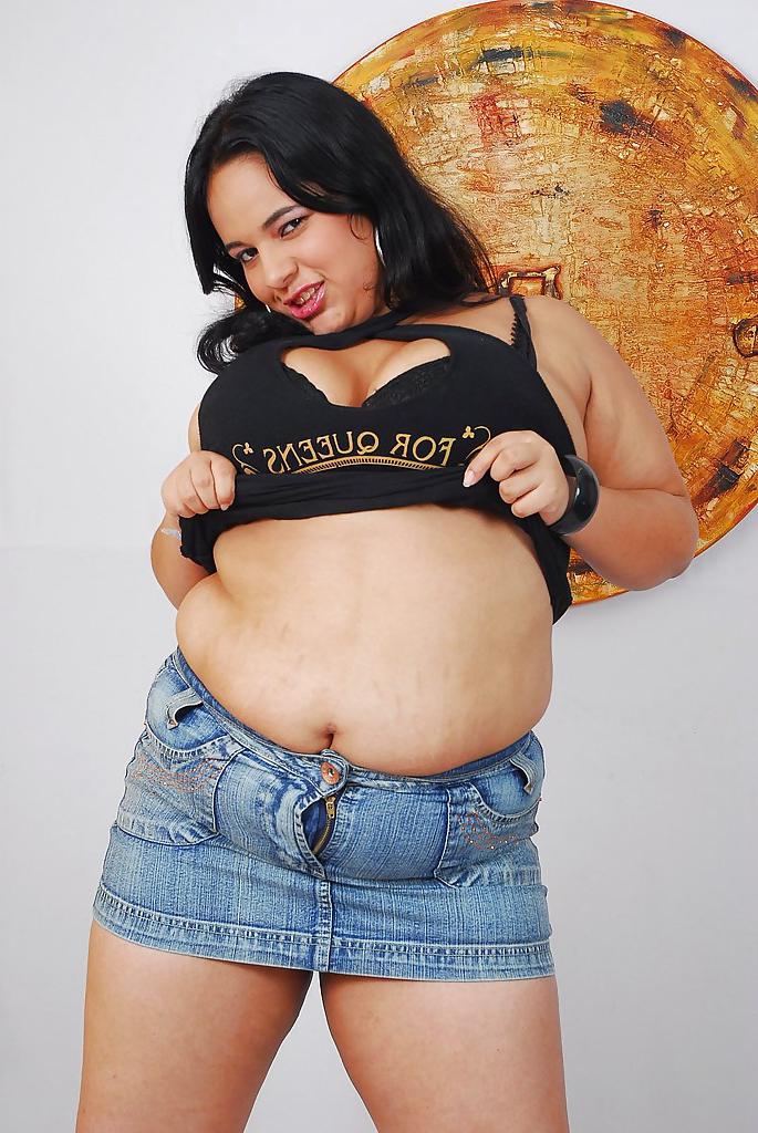 16P Sassy latina plumper with shaved cunt undressing and caressing herself