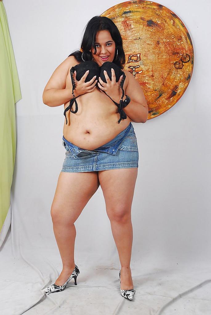 16P Sassy latina plumper with shaved cunt undressing and caressing herself