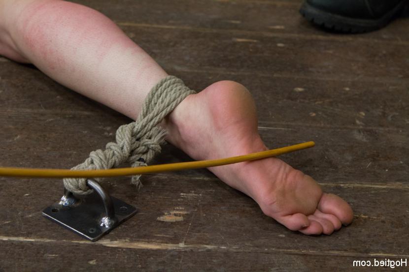 15P Submissive girl is restrained and penetrated by a couple of lesbians