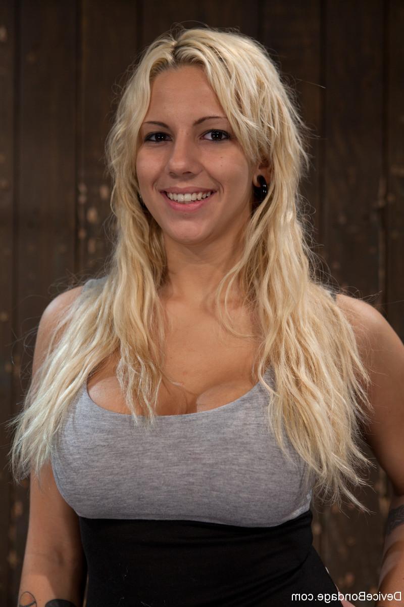 20P Blonde babe Lylith Lavey gets restrained in metal bondage while naked