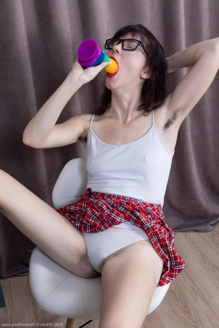 20P Nerd Polly White deepthroats a colorful dildo & fucks her hairy pussy with it