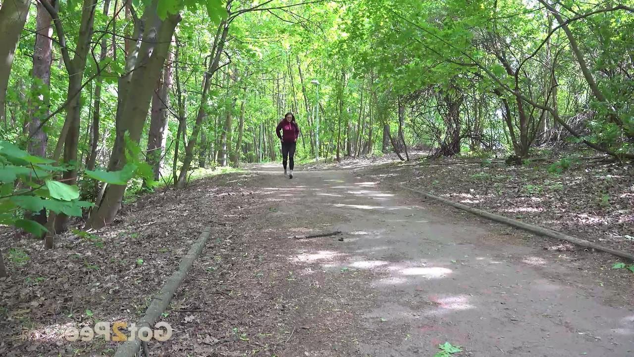 15P Barbe pulls down black leggings to pee on a roadway through the woods